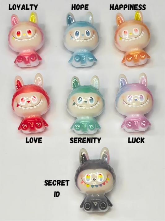 colorful figurines with labels above each one on a white background